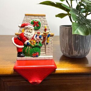 Vintage Enesco Christmas Stocking Hanger Cast Iron Santa Toys Fireplace Mantel